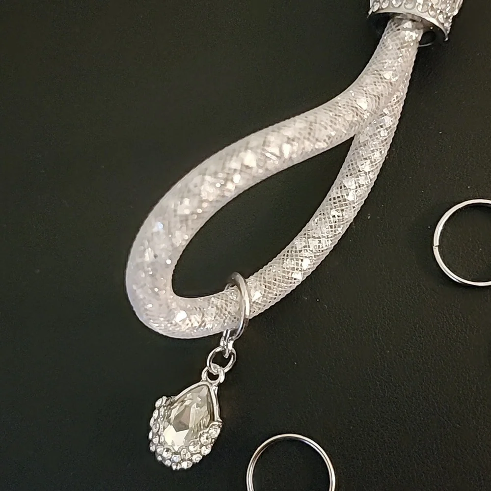 Elegant Silver Keychain And Accessory